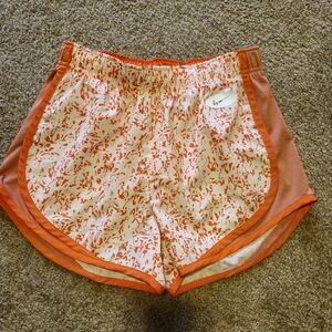 Nike Women's Athletic Shorts in Orange and White Pattern
